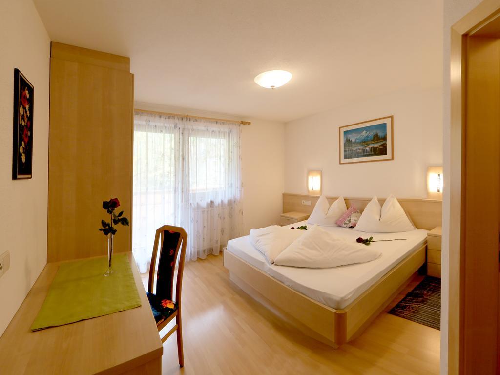 Garni Appartement Alpenresidence Cadipietra Habitación foto