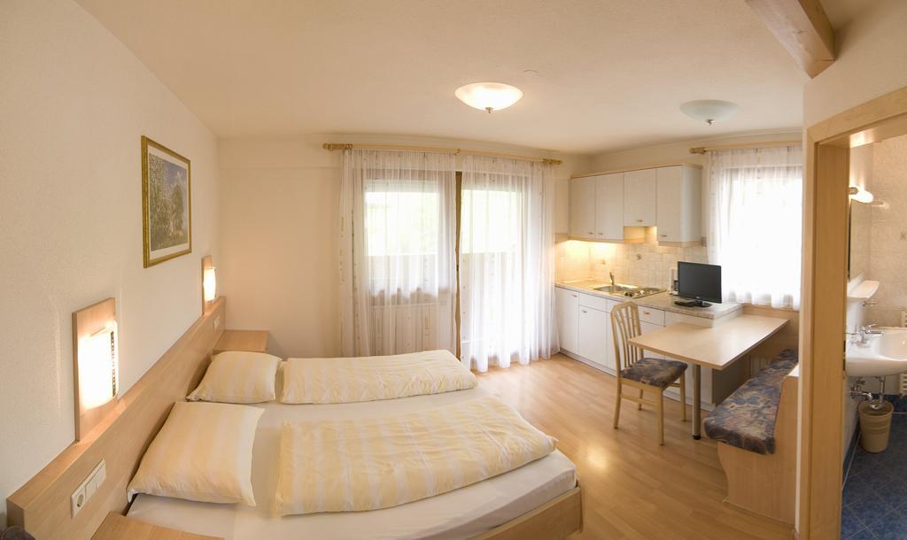 Garni Appartement Alpenresidence Cadipietra Habitación foto